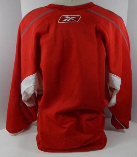 Carolina uragani 52 Igra izdana crvena praksa Jersey 58 DP24965 - Igra korištena NHL dresova